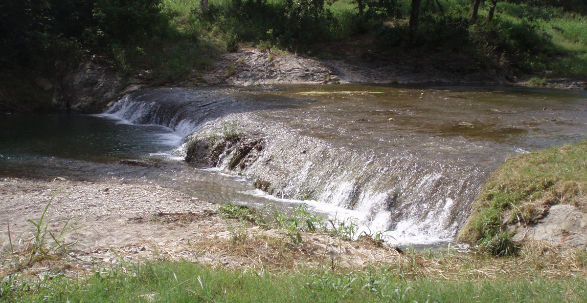 Image of creek to illustrated need for conservation