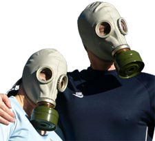 Couple wearing gas masks